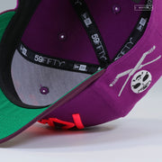LOS ANGELES KINGS CROSSED STICKS AND HOCKEY MASK GRAPE SODA NEW ERA FITTED CAP