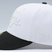 LOS ANGELES KINGS CROSSED HOCKEY STICKS GLOW IN THE DARK GLACIAL WHITE NEW ERA FITTED CAP