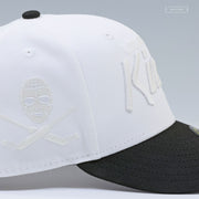 LOS ANGELES KINGS CROSSED HOCKEY STICKS GLOW IN THE DARK GLACIAL WHITE NEW ERA FITTED CAP