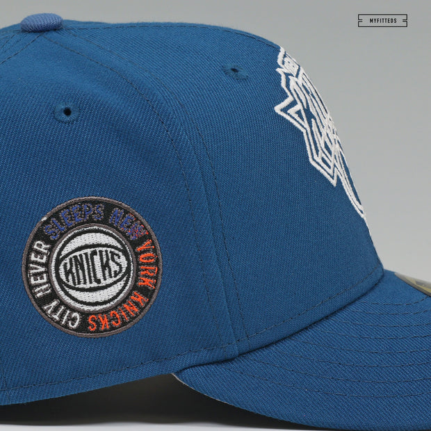 NEW YORK KNICKS THE CITY NEVER SLEEPS STENCIL WEATHERED LOOK NEW ERA FITTED CAP